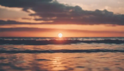 A calming scene of a sunset over a calm ocean, Enhance