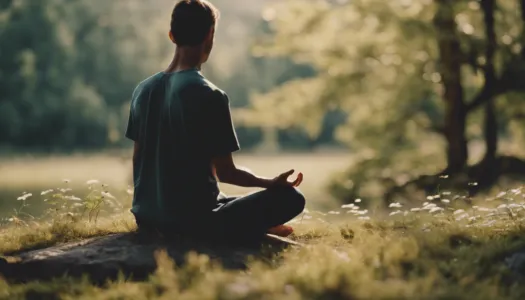 A person meditating in nature, symbolizing overcoming psychological barriers